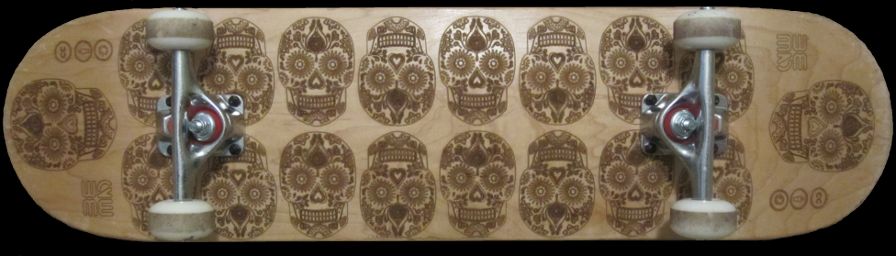 Laser engraved skateboard - sugar skull design